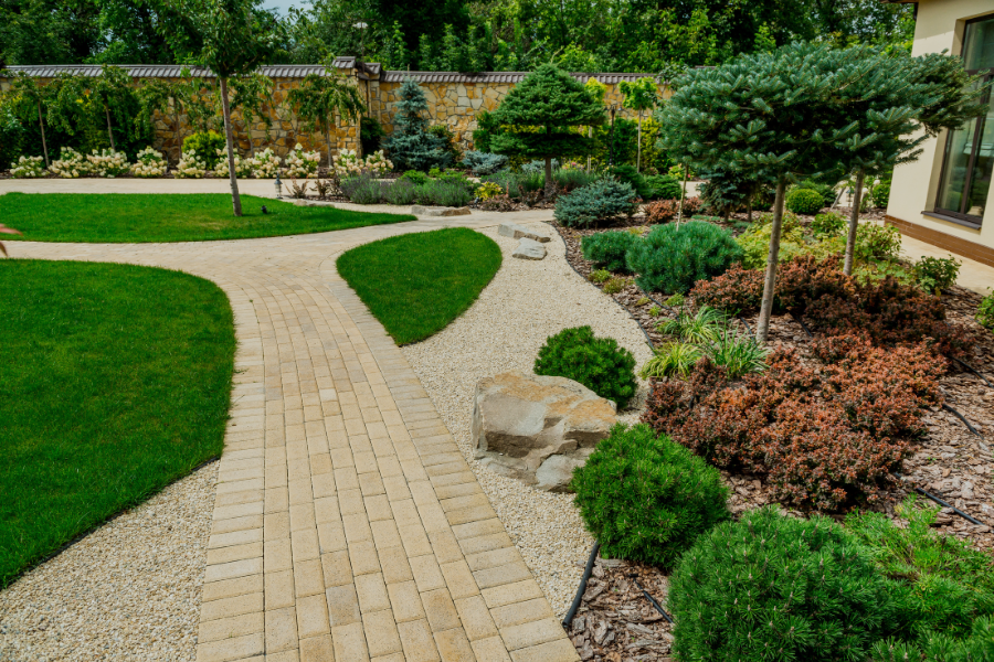 Mature Cole Landscaping low-maintenance landscape on a North Shore property