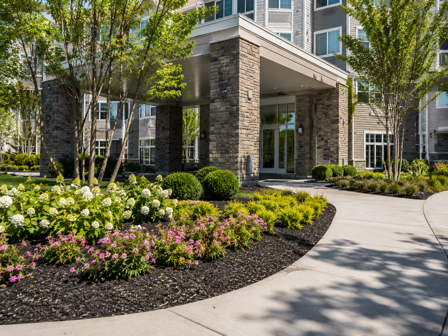 Professionally maintained commercial property entrance landscaping by Cole Landscaping on the North Shore of Massachusetts